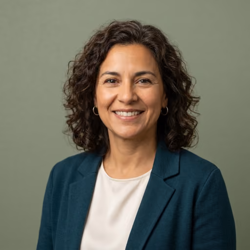 A headshot of Maria Rodriguez.