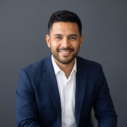 A headshot of Michael Torres.