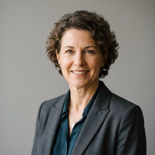 A headshot of Sarah Mitchell.