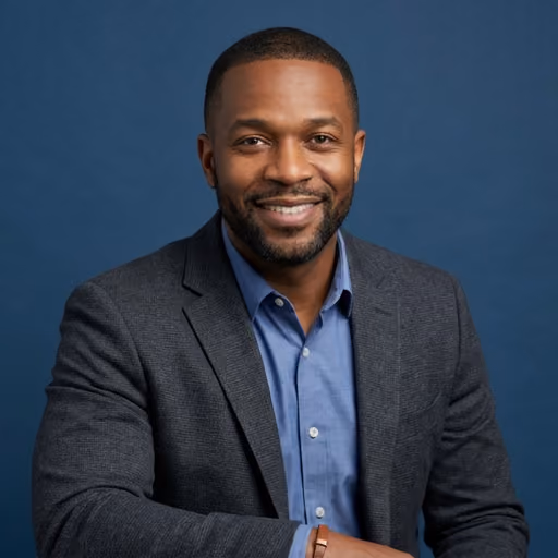 A headshot of Thomas Adeyemi