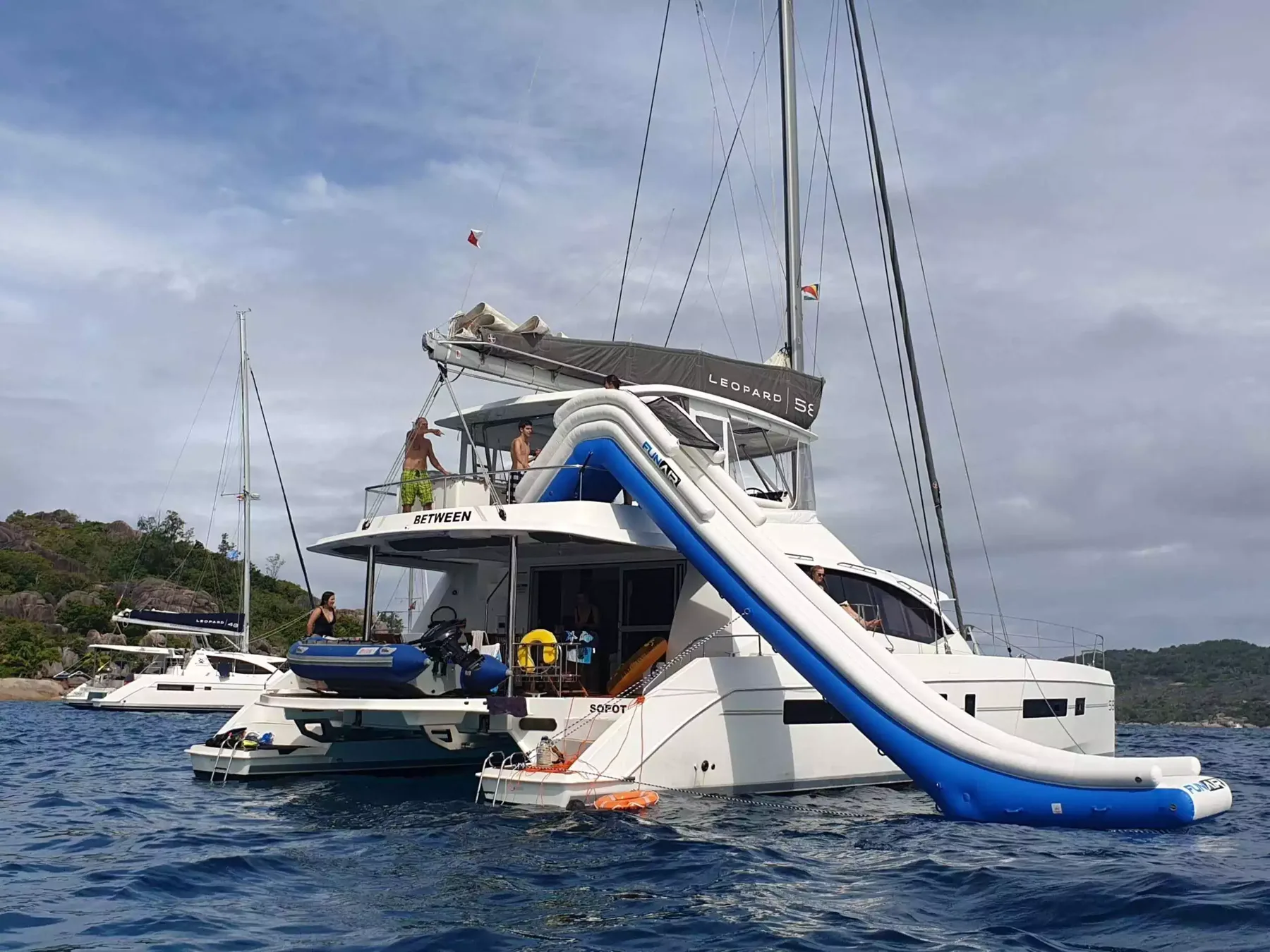 Sea pool and slide rigged at the stern of a catamaran