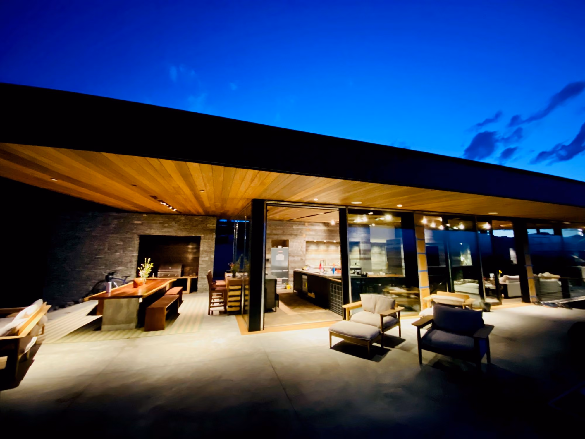 Patio at night at Saddle Butte, a custom luxury home