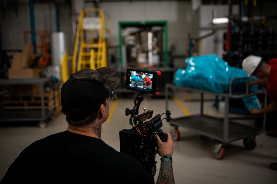 Filming an interview between stations