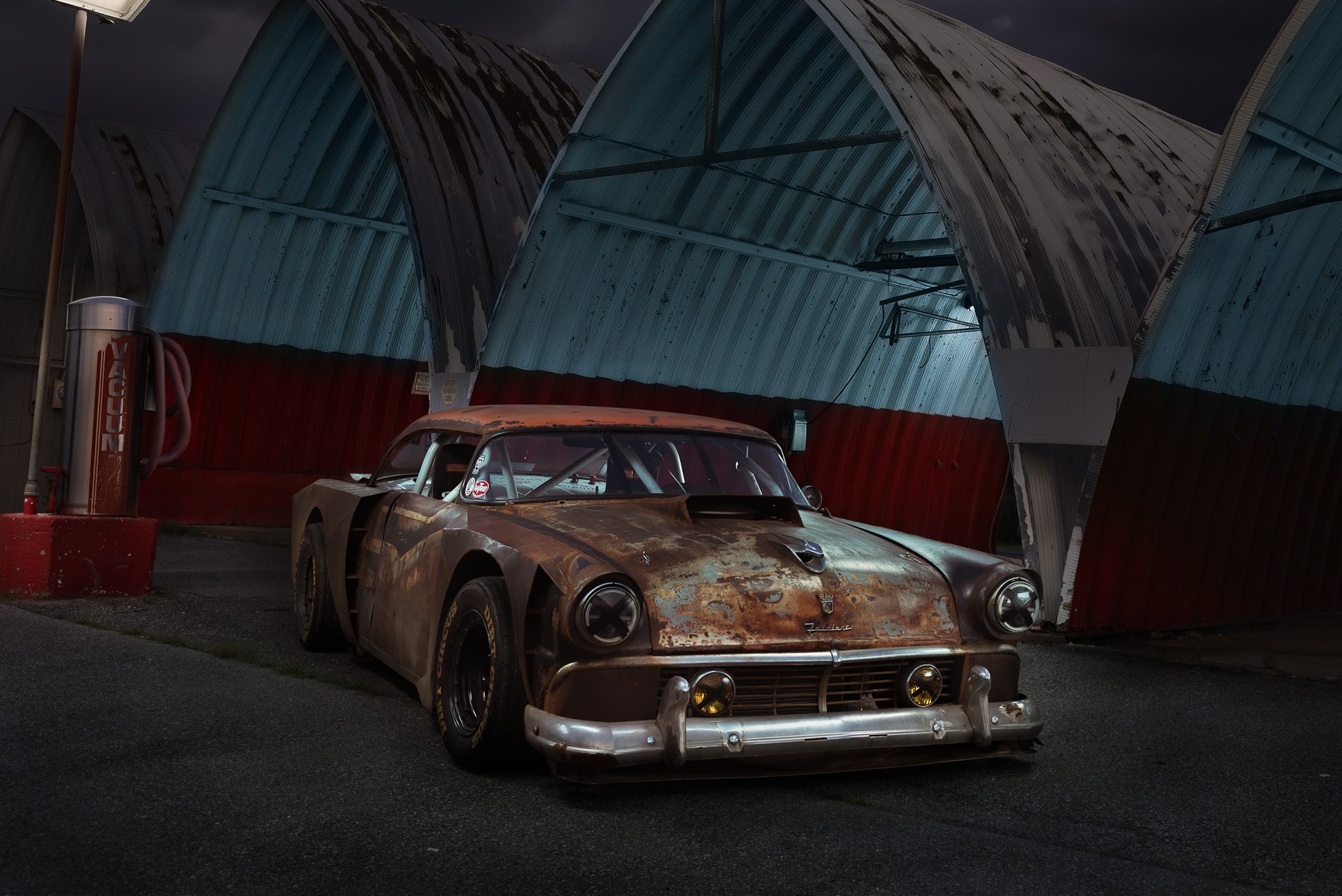 Quonset hut shop at night
