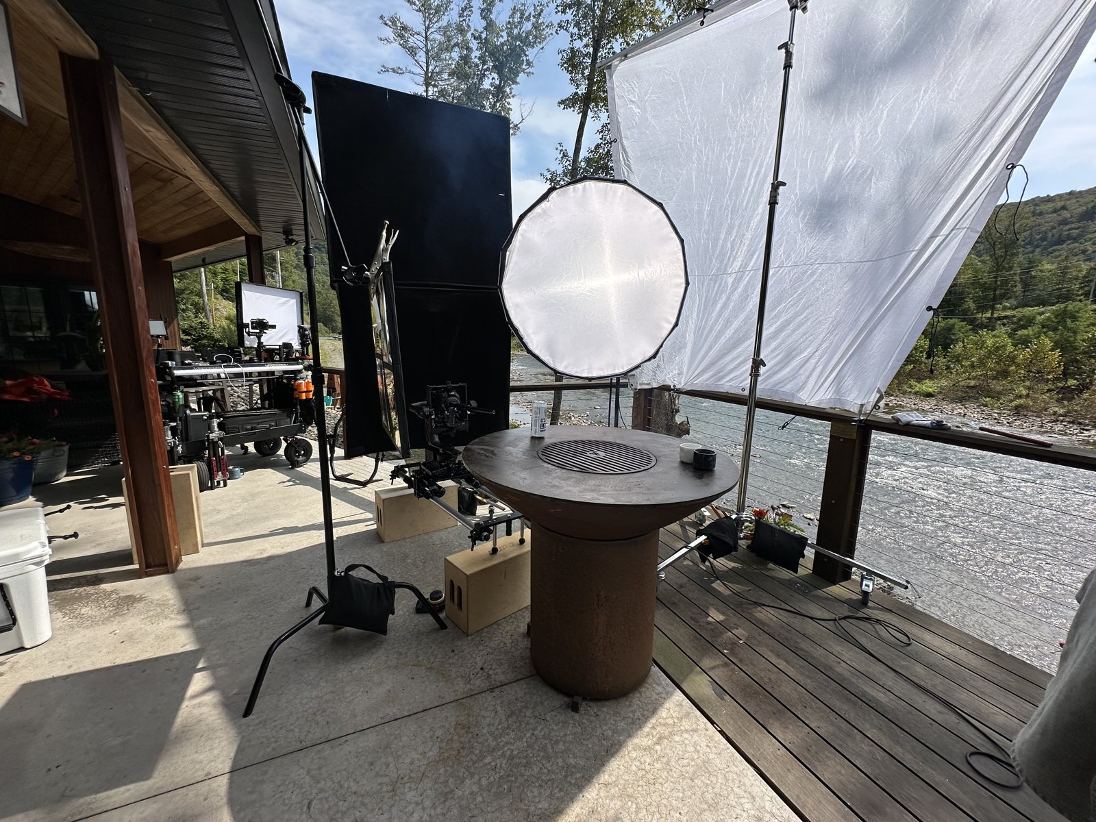 Creekside tailgate set with lighting rig and scrim