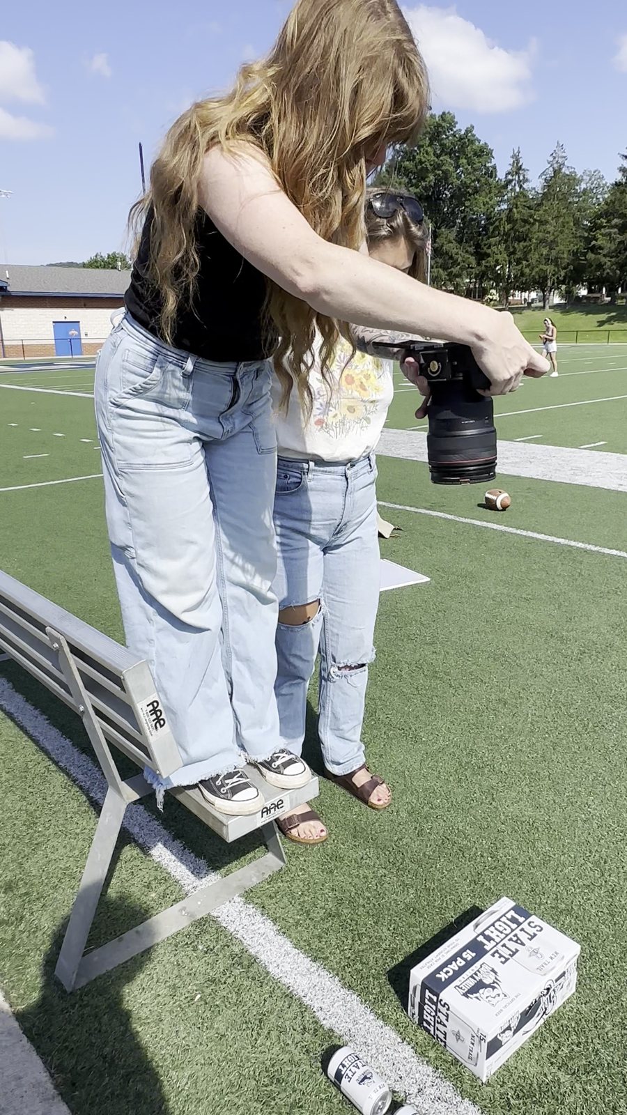 Placing a State Light can on the turf before the shot