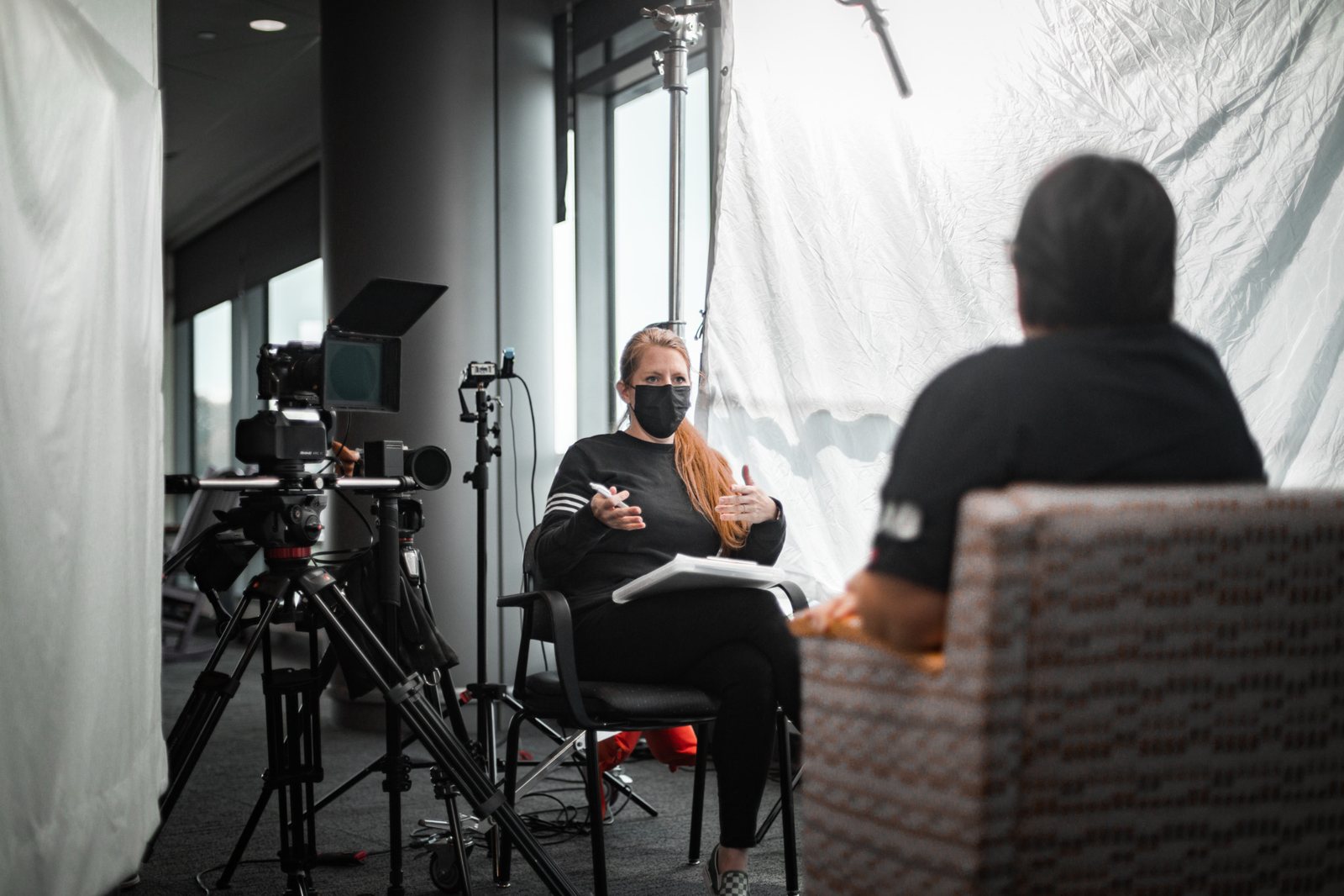 Interview setup with lights and camera in a hospital room