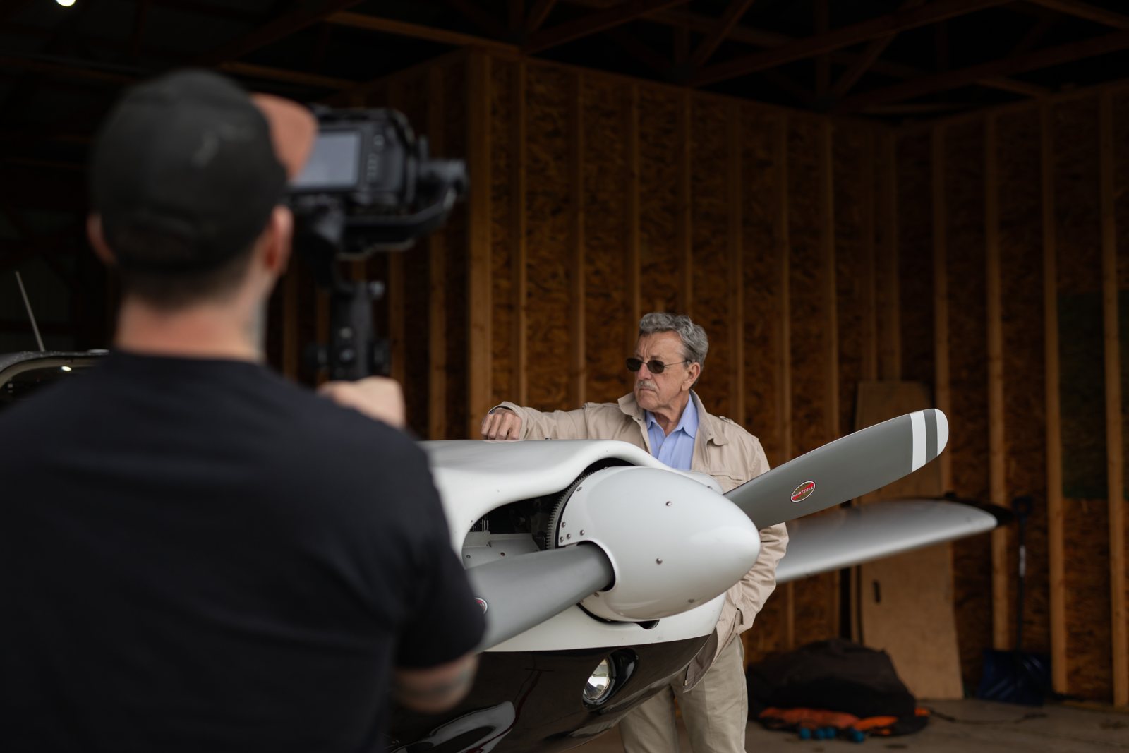 Filming a patient story in an aircraft hangar