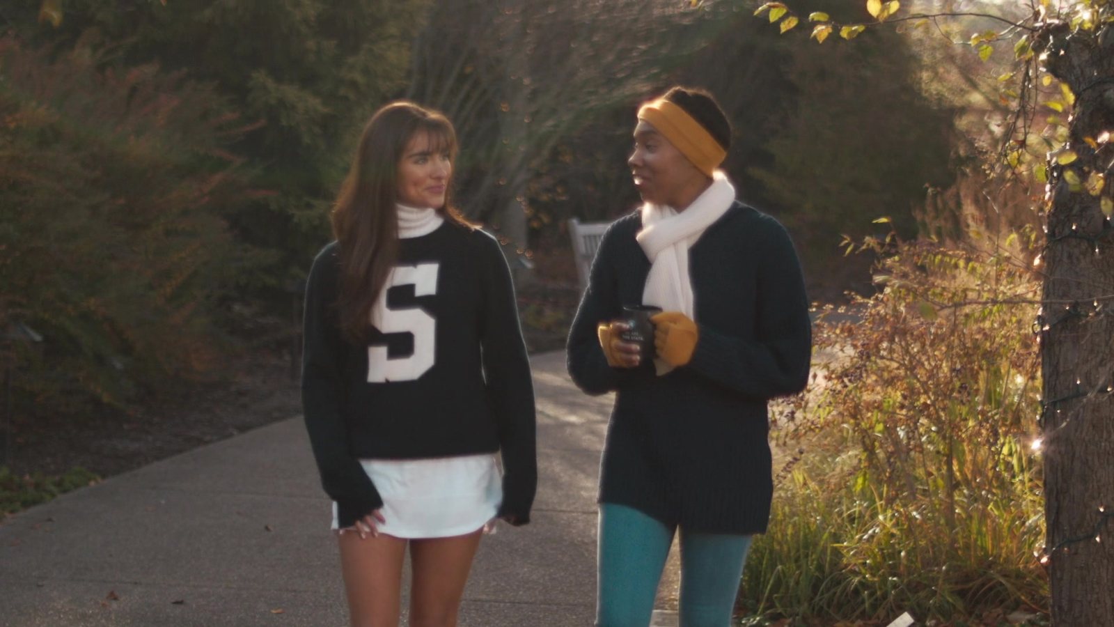 Two Penn State students talking on an Arboretum path