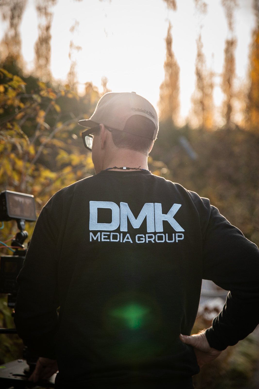 DMK crew member on set at the Arboretum