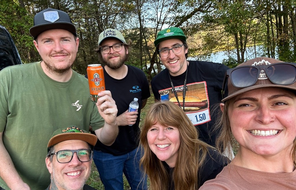 DMK crew group selfie by the lake during the New Trail Broken Heels shoot