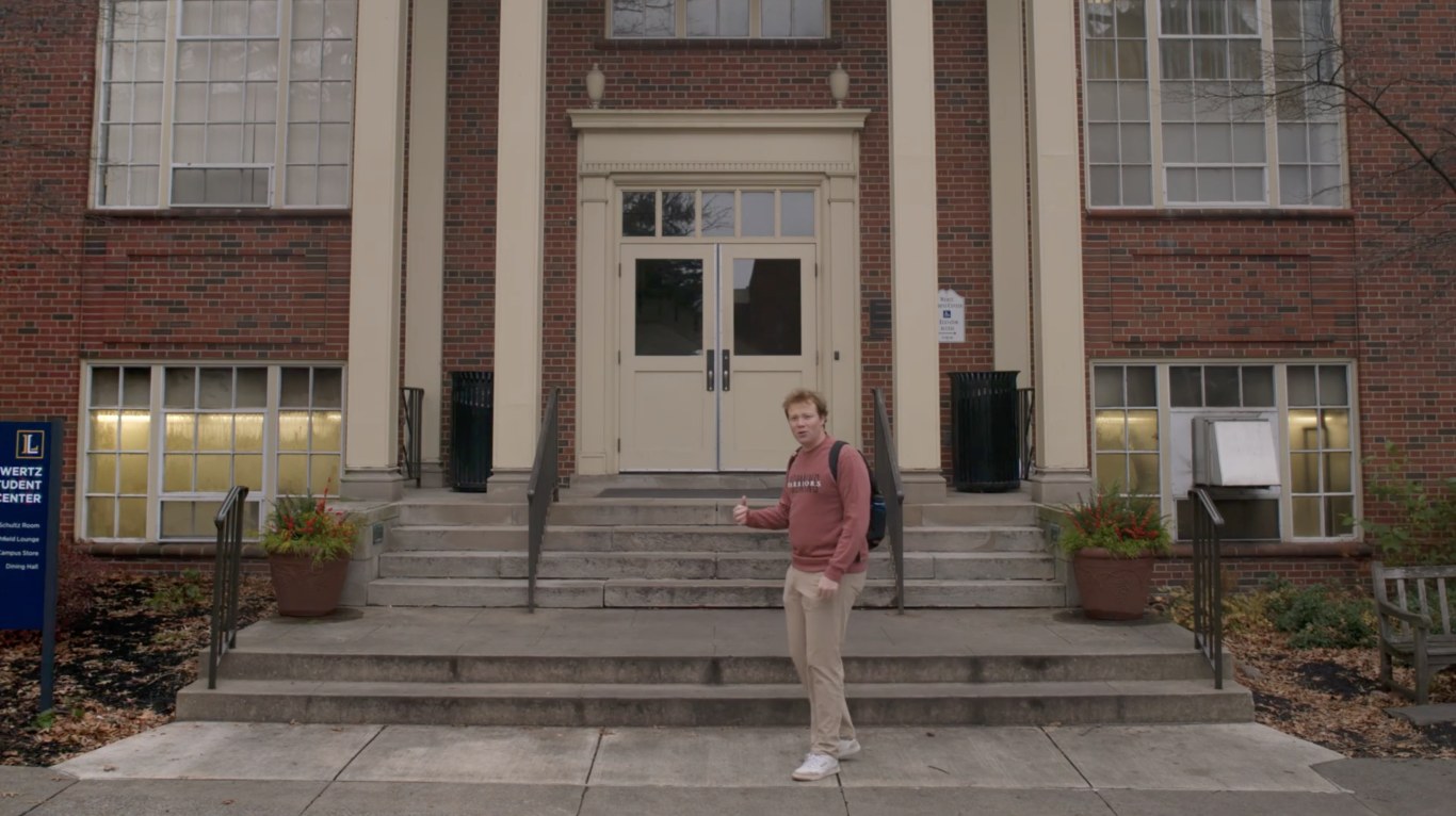 The host on the steps of the Wertz Student Center at Lycoming College