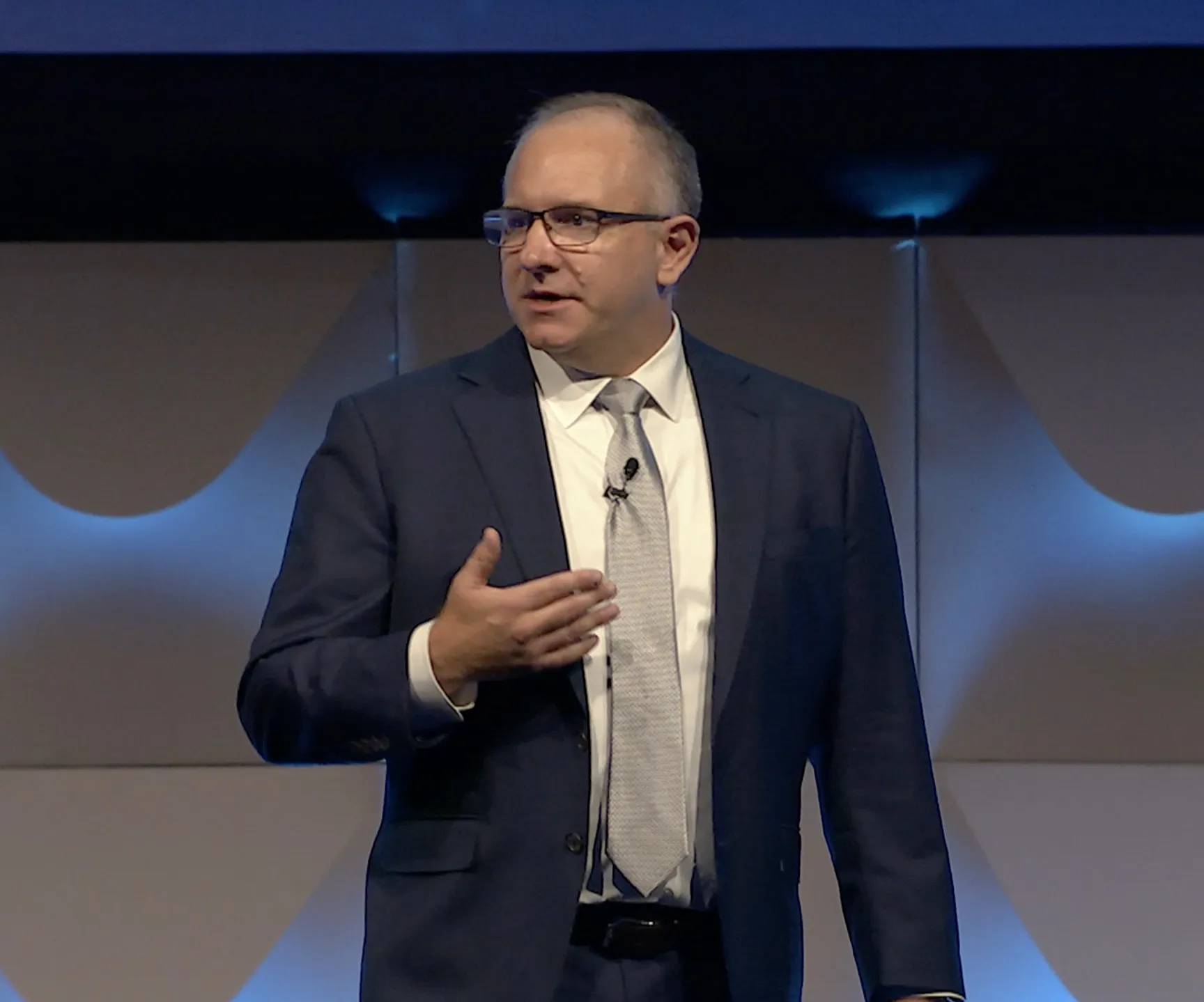 Ed Venit speaking on stage