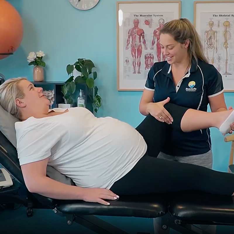 BeachLife physiotherapist treating a pregnant patient in clinic