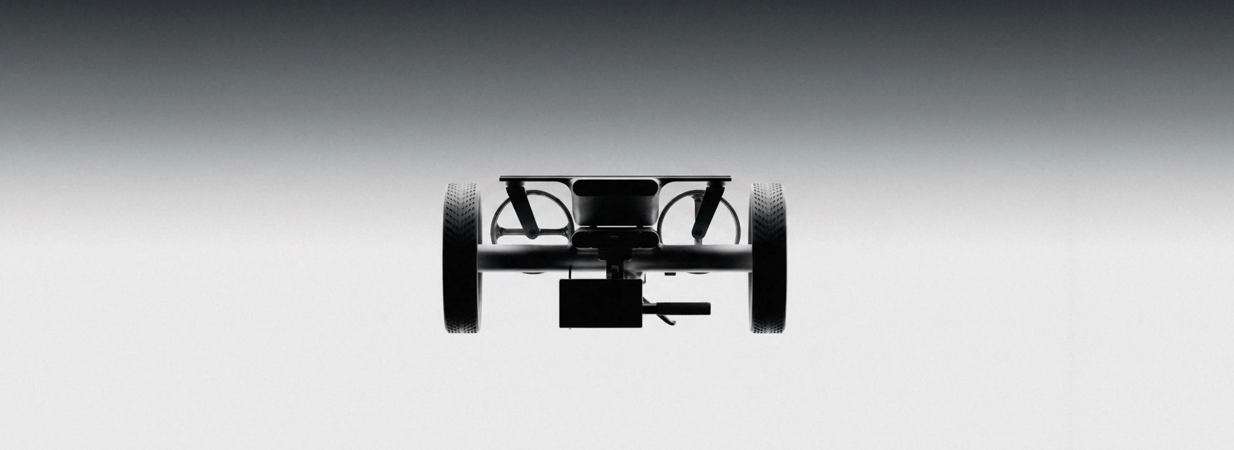 Minimalistic front view of a ixi autonomous golf trolley with two large wheels and a central platform against gray background.