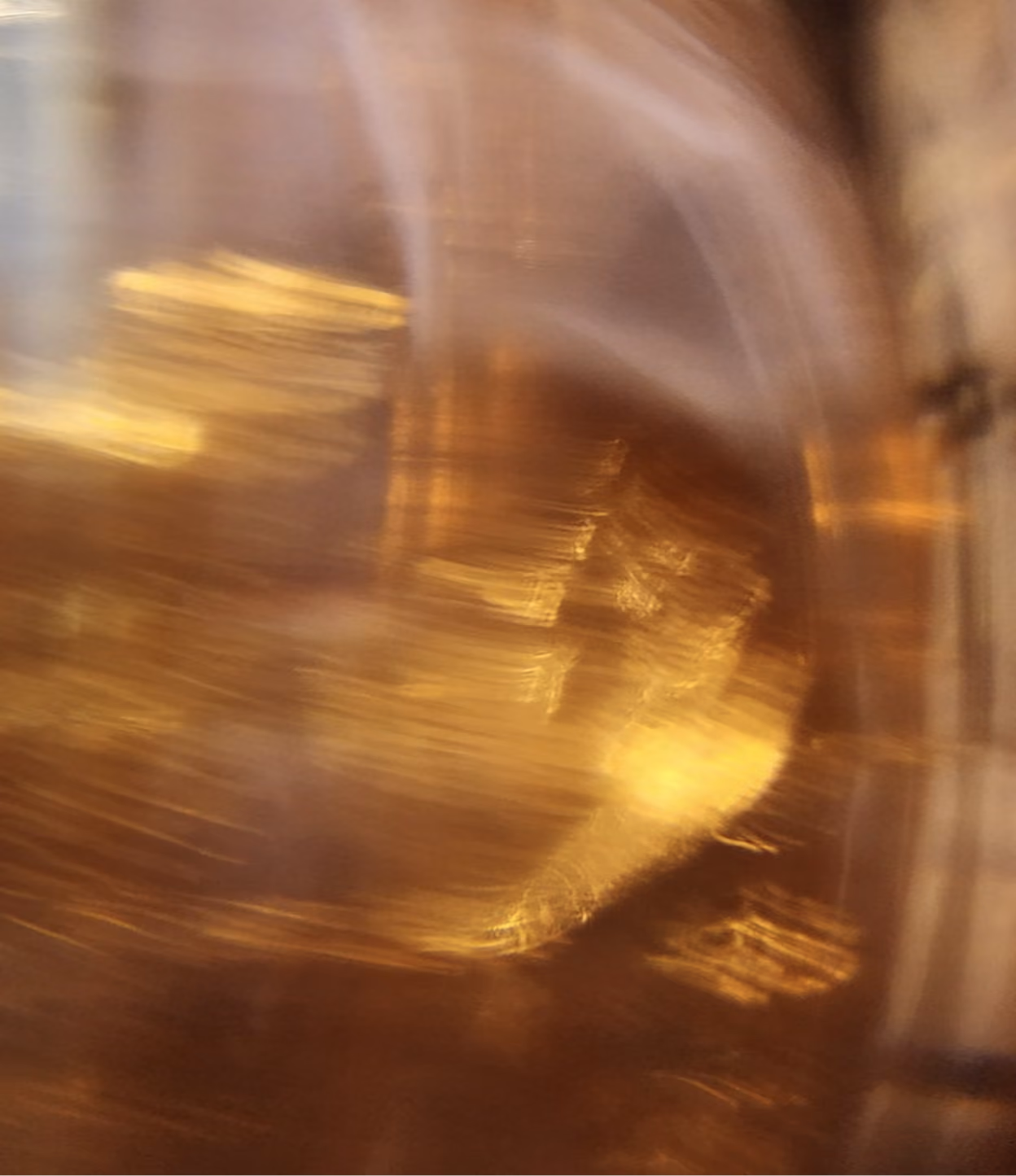 Blurred golden lights creating an abstract, shimmering effect.