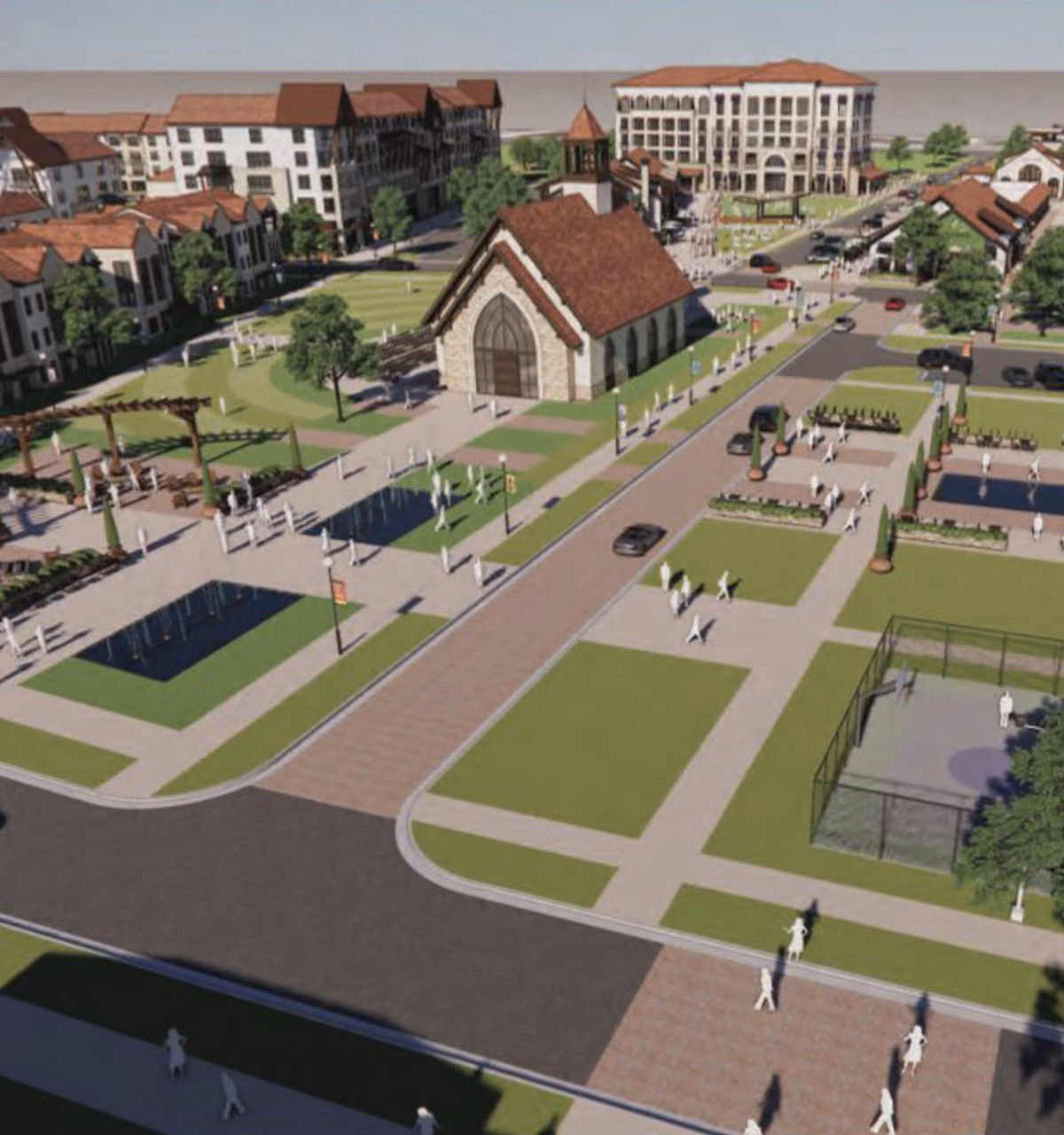 Aerial view of a town square with a chapel, pathways, green lawns, and surrounding buildings.