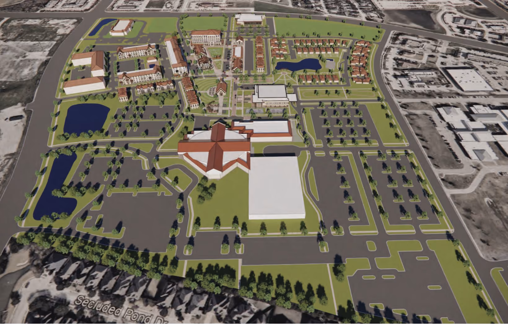 Aerial view of a campus with multiple buildings, parking lots, ponds, and green spaces.