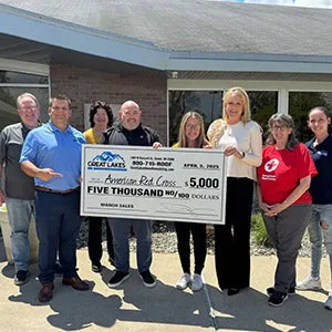Handing a charity check