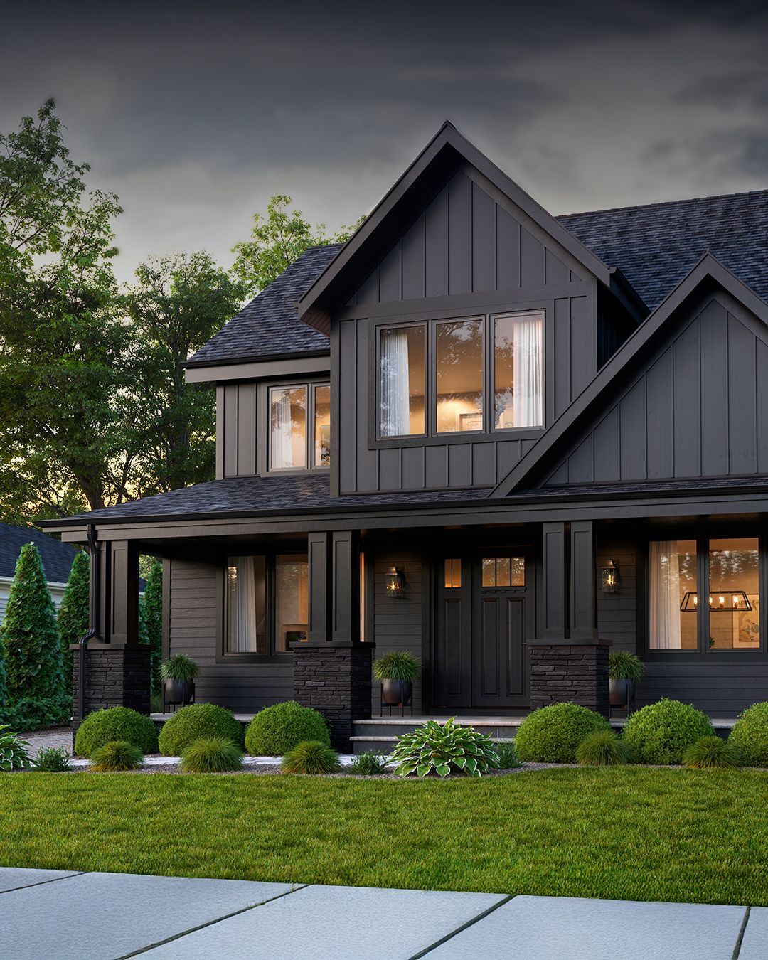 Modern home with dark gray board and batten siding