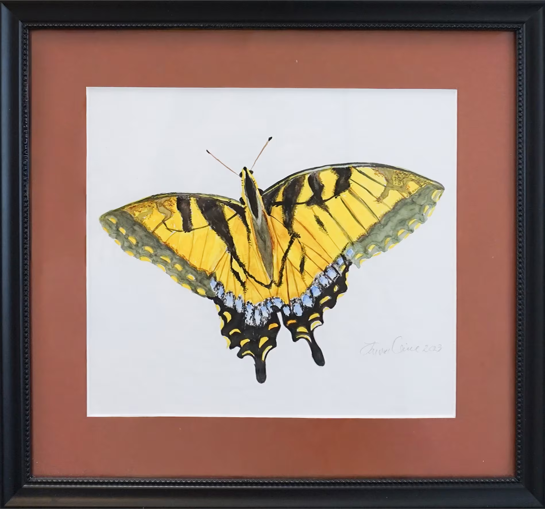 Framed painting of a yellow and black butterfly with wings spread open.