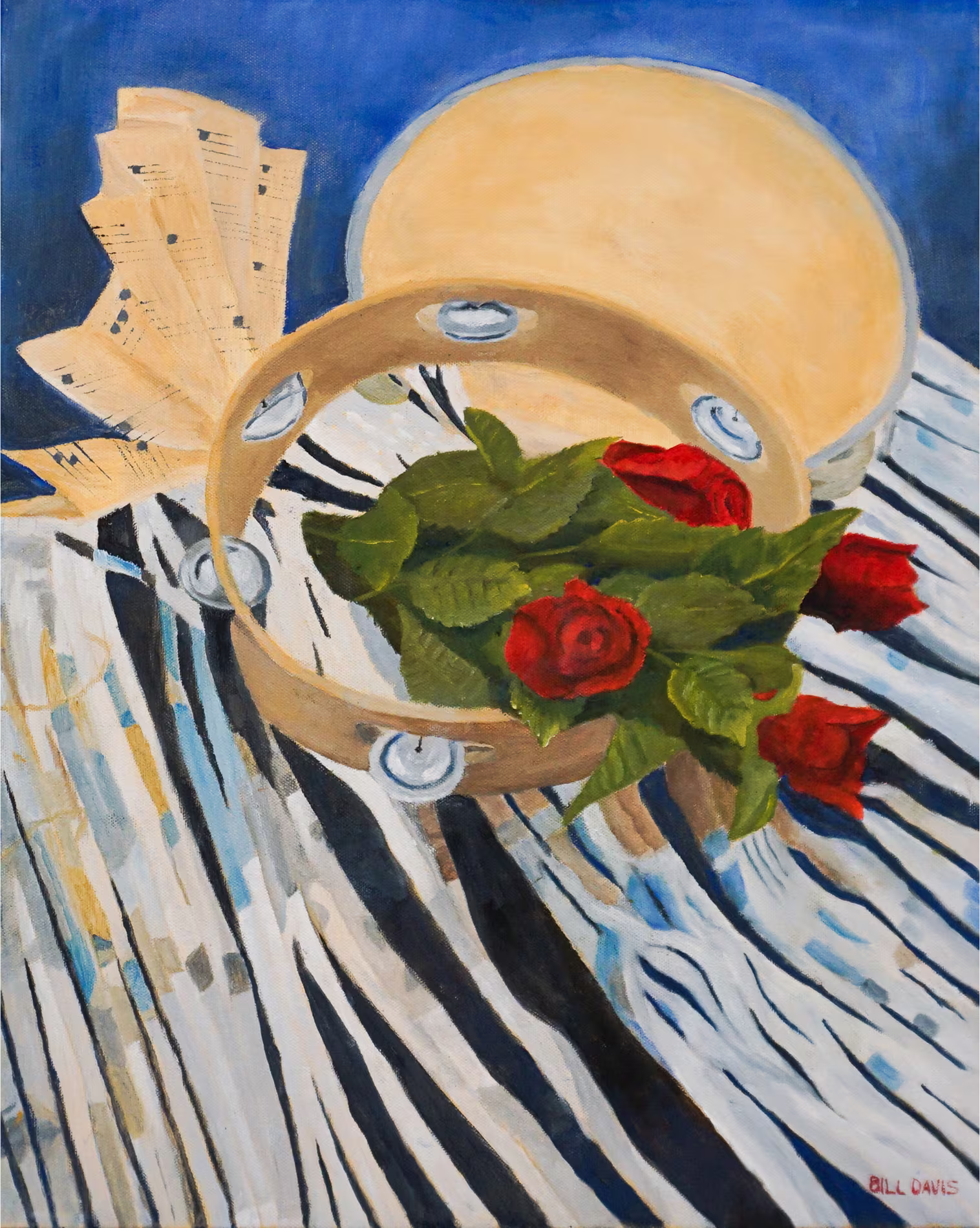A tambourine with red roses and sheet music is placed on a patterned cloth.