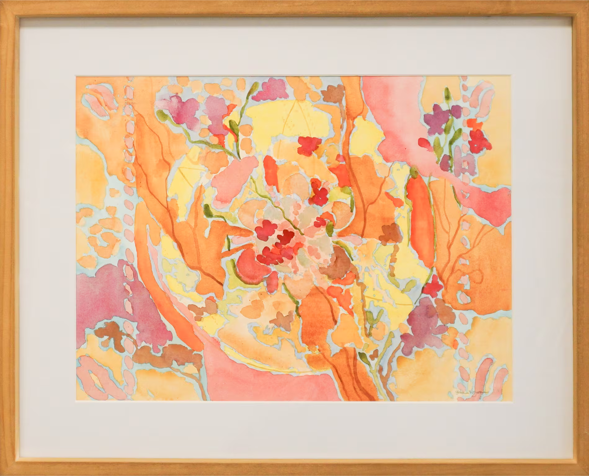 A colorful abstract painting with floral patterns in orange, pink, and yellow hues, framed in wood.