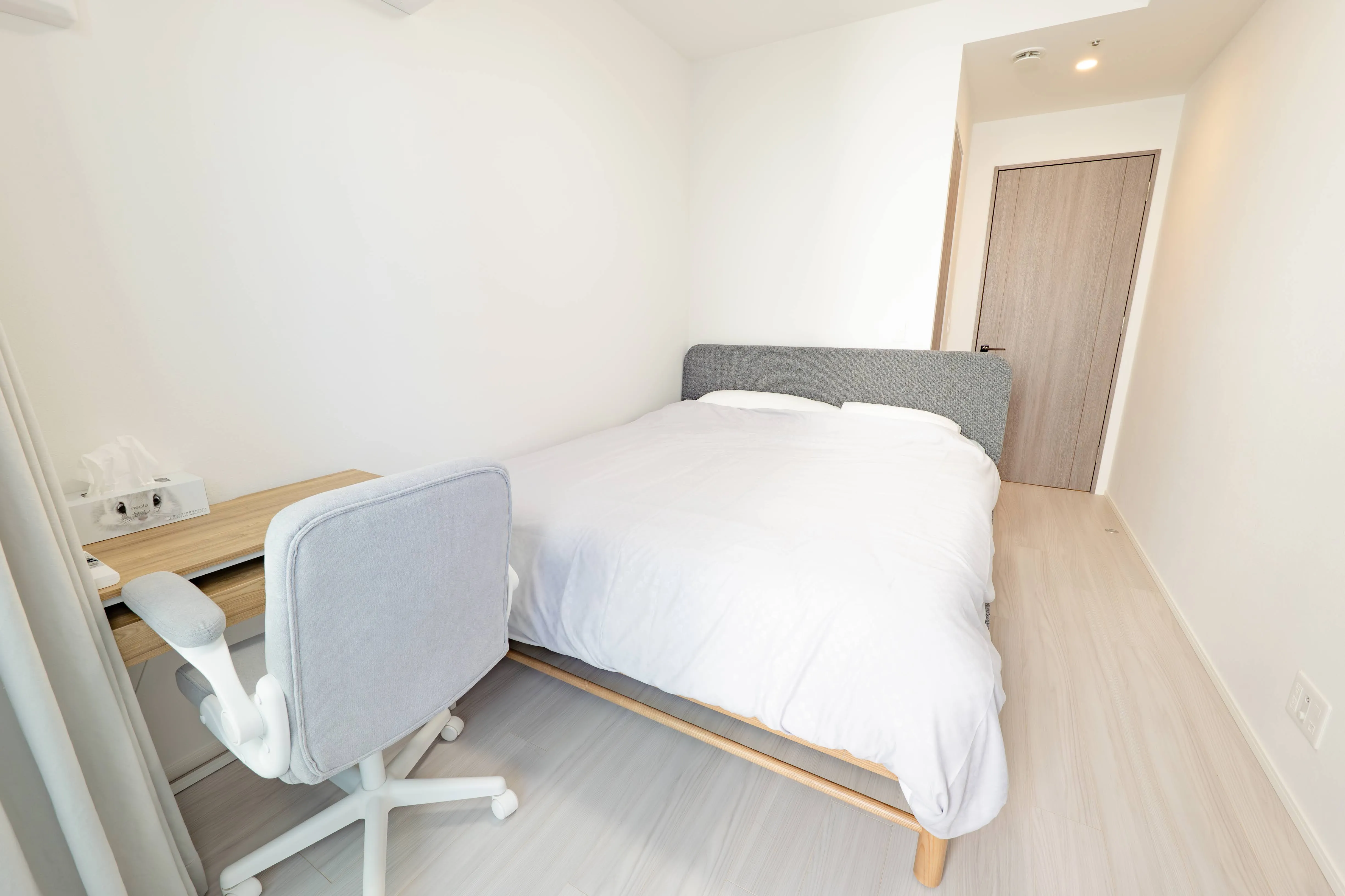 Bed room of Room 911 at ONE Sapporo Station Tower.