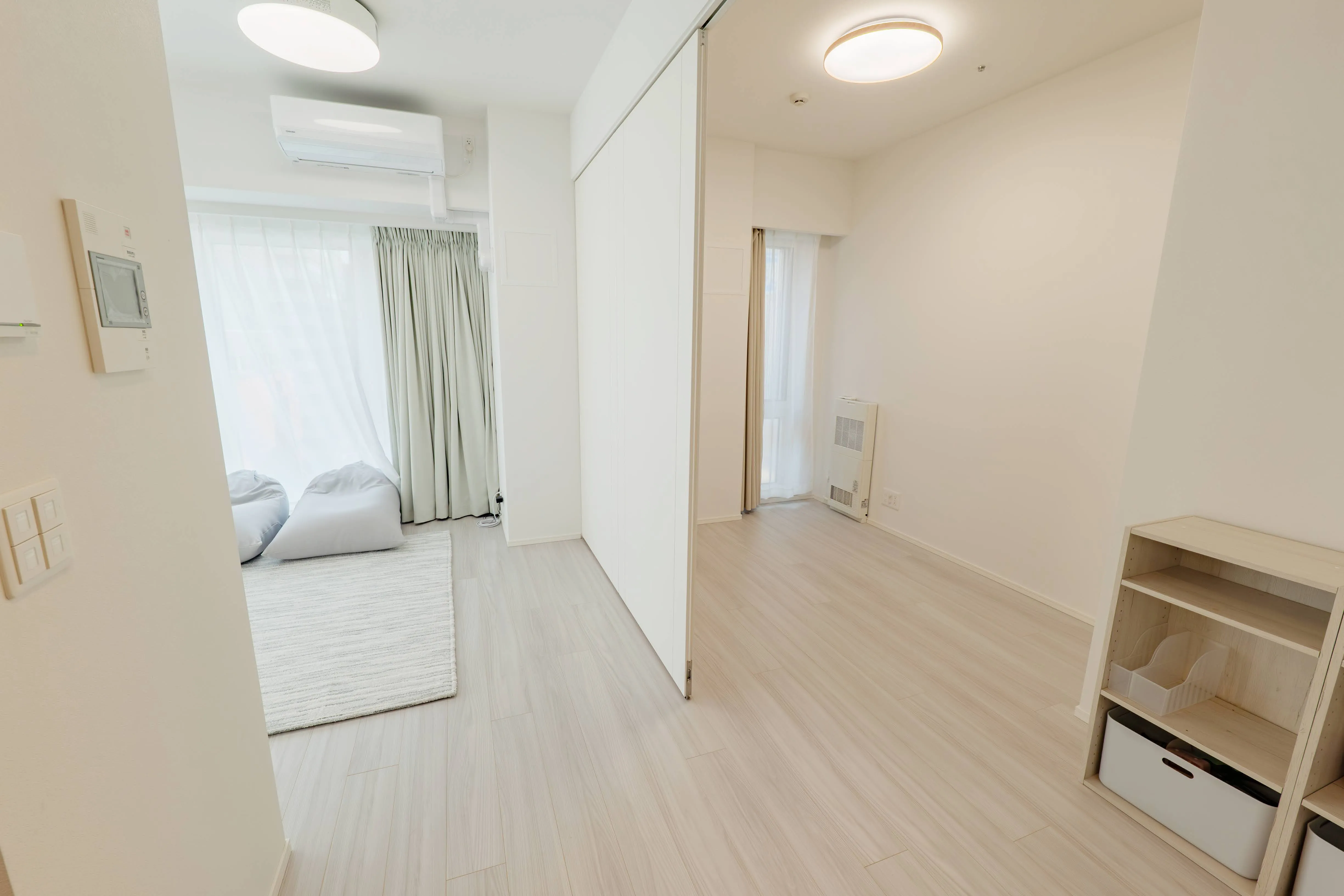 Living room of Room 911 at ONE Sapporo Station Tower.