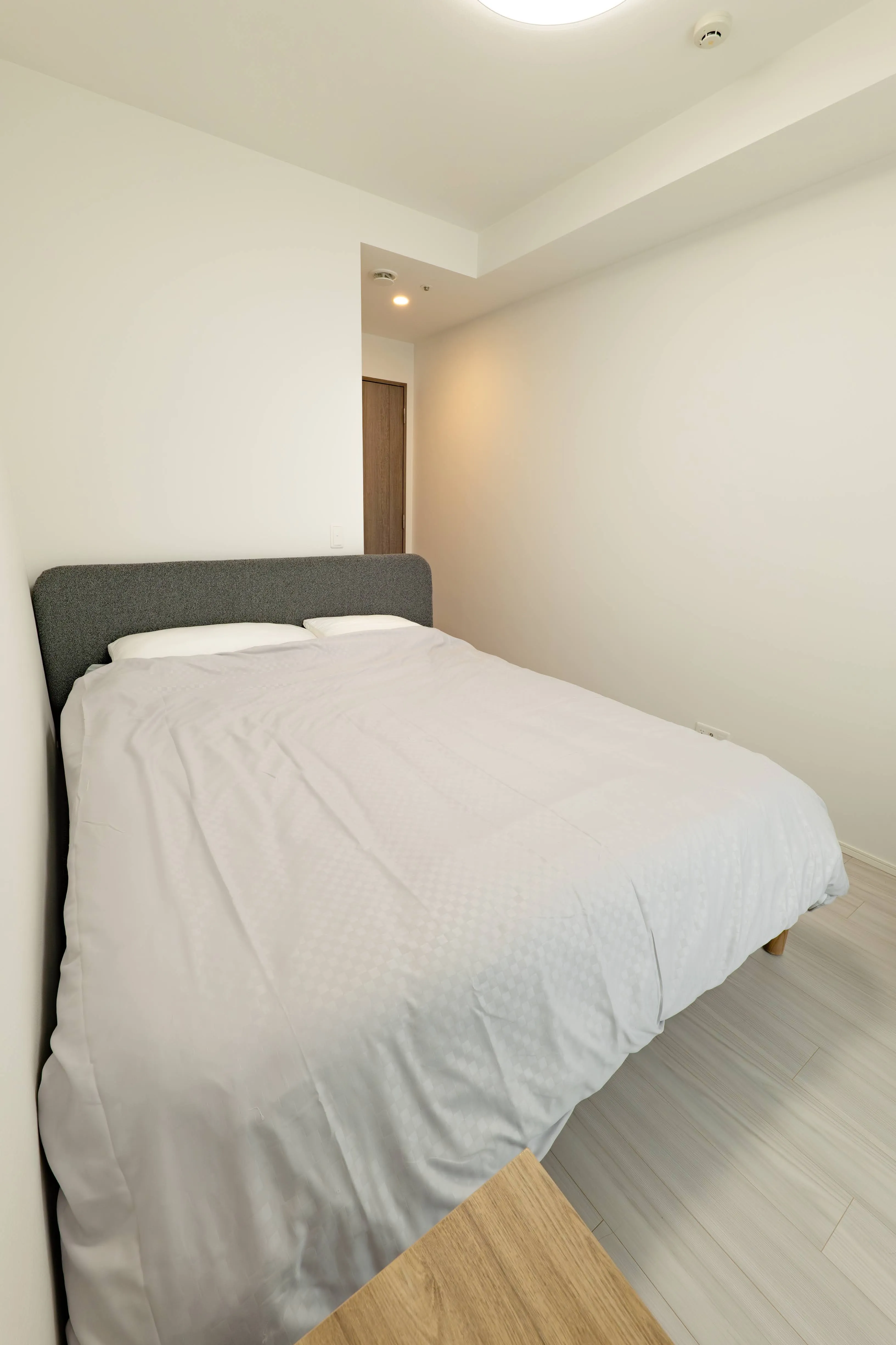 Bedroom of Room 911 at ONE Sapporo Station Tower.