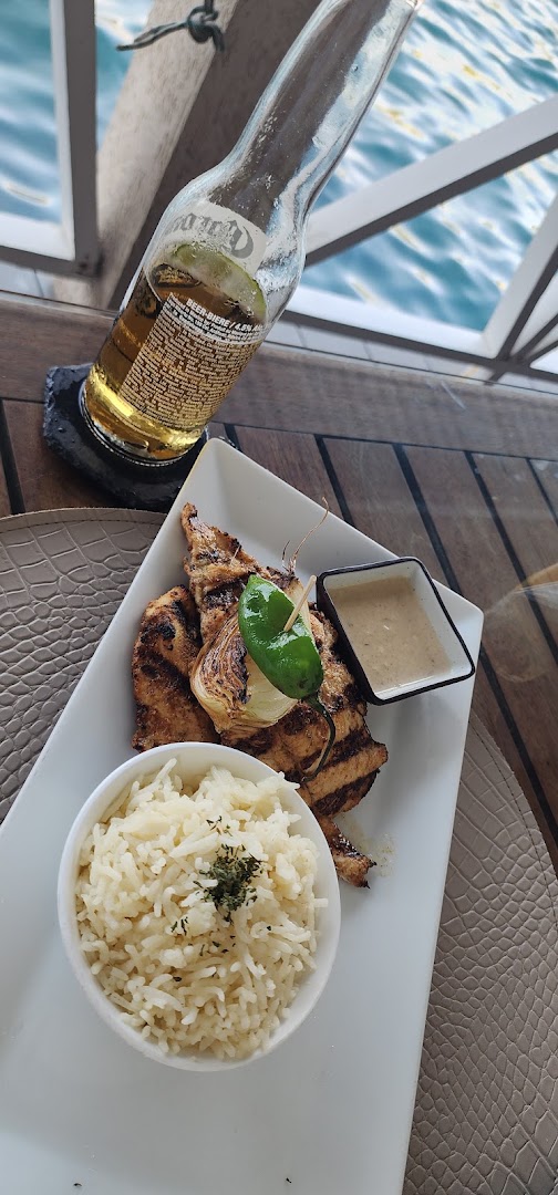 Waterfront plated meal at Sails Restaurant Grenada