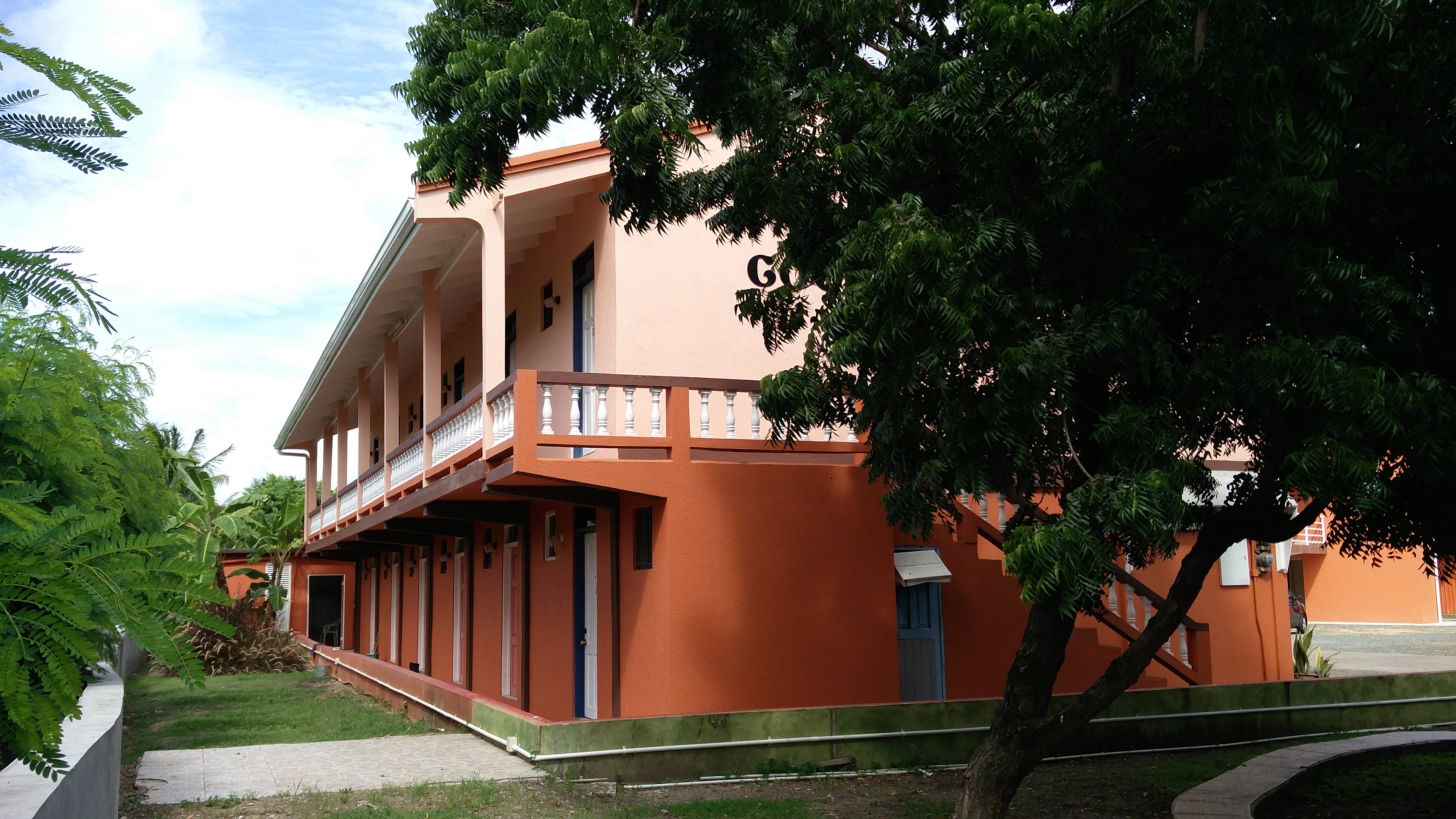 Cool Running Apartments building and landscaped grounds