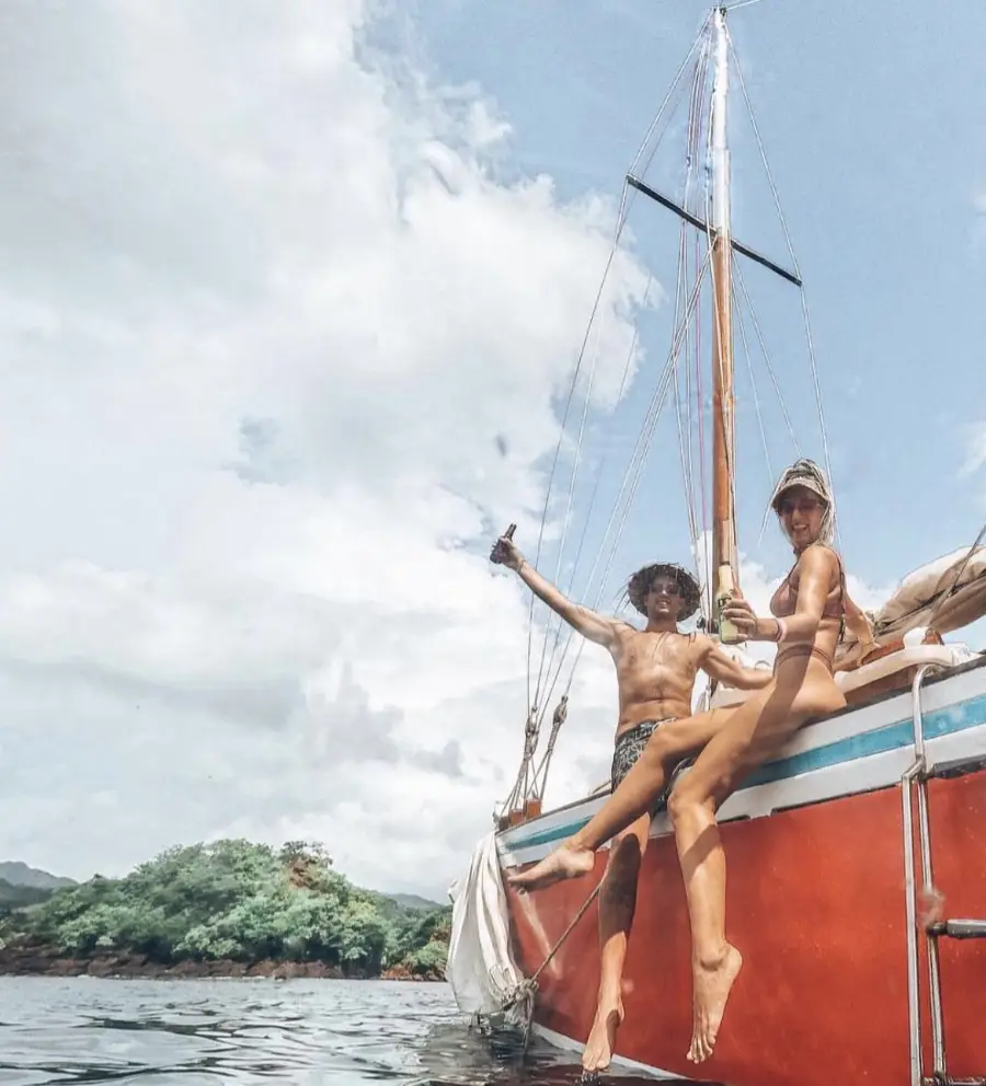 Guests enjoying time aboard the Savvy traditional sailing sloop