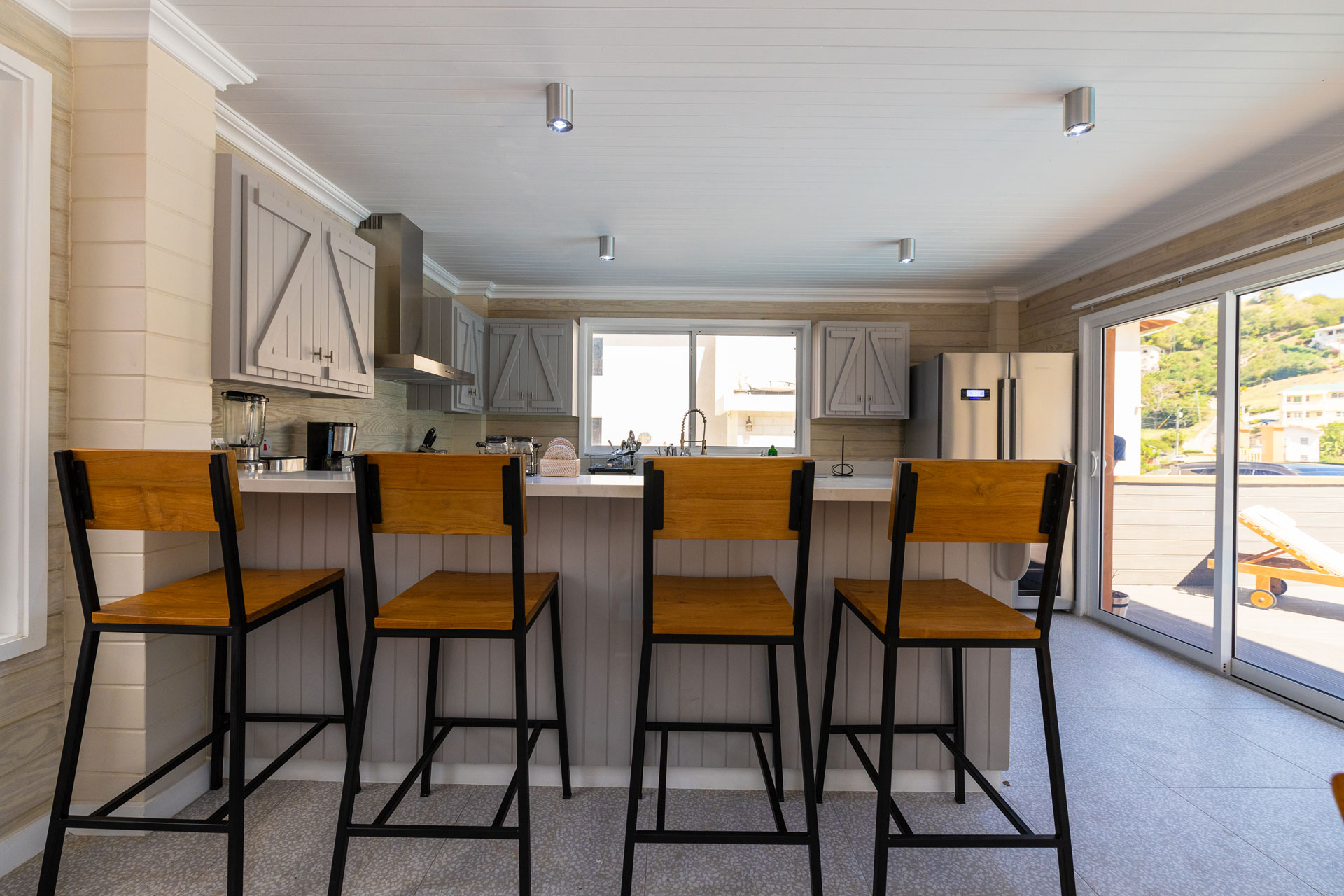 Nutmeg Garden Pool House II kitchen and dining area
