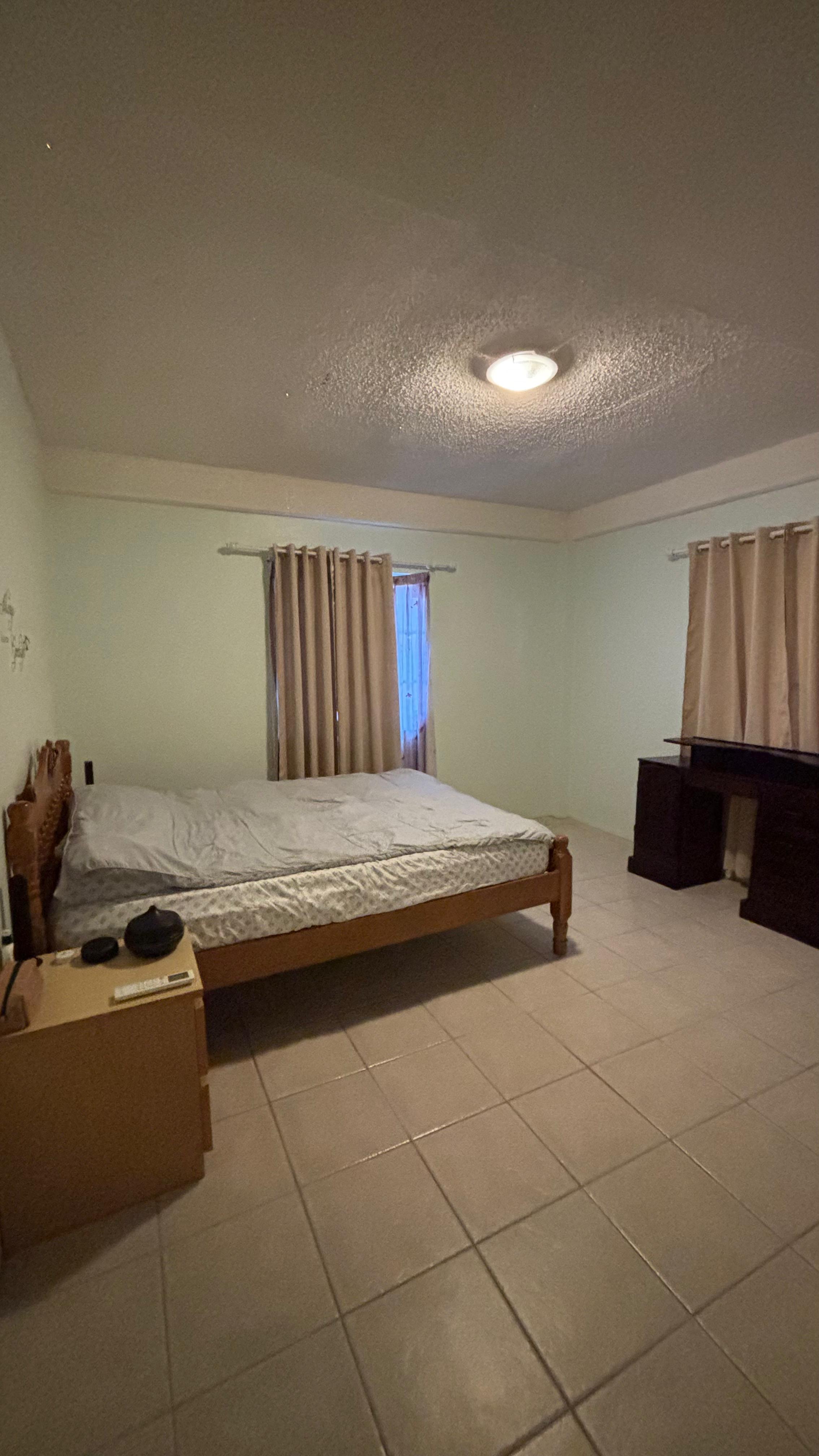 Ginger Court I furnished air-conditioned bedroom