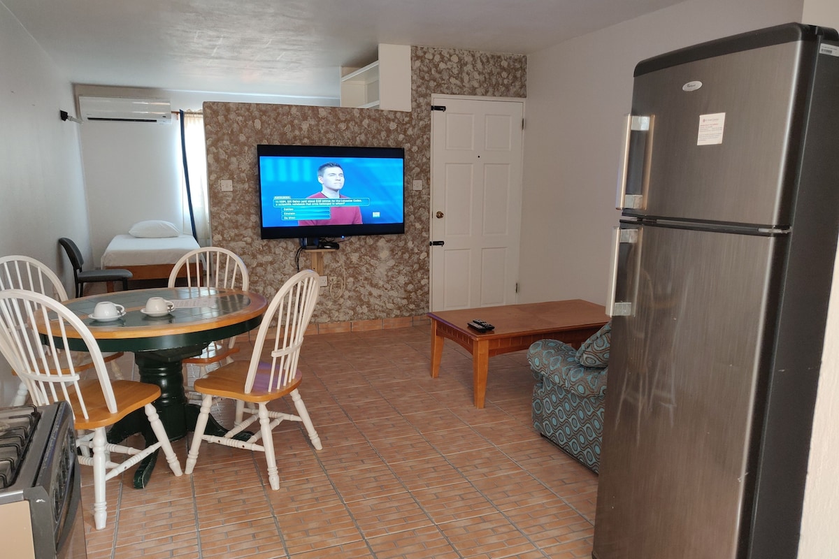 Breadnut Court Deluxe – living and dining area