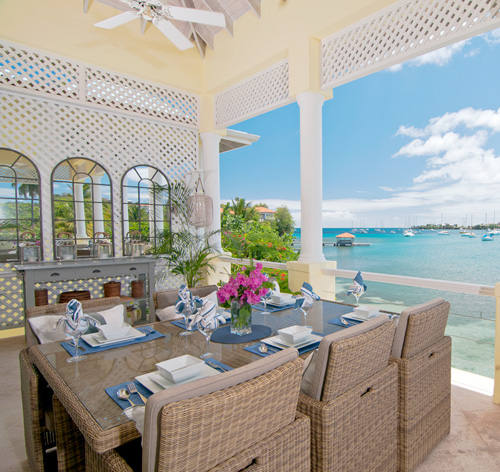 Rolling Surf covered dining terrace overlooking the bay