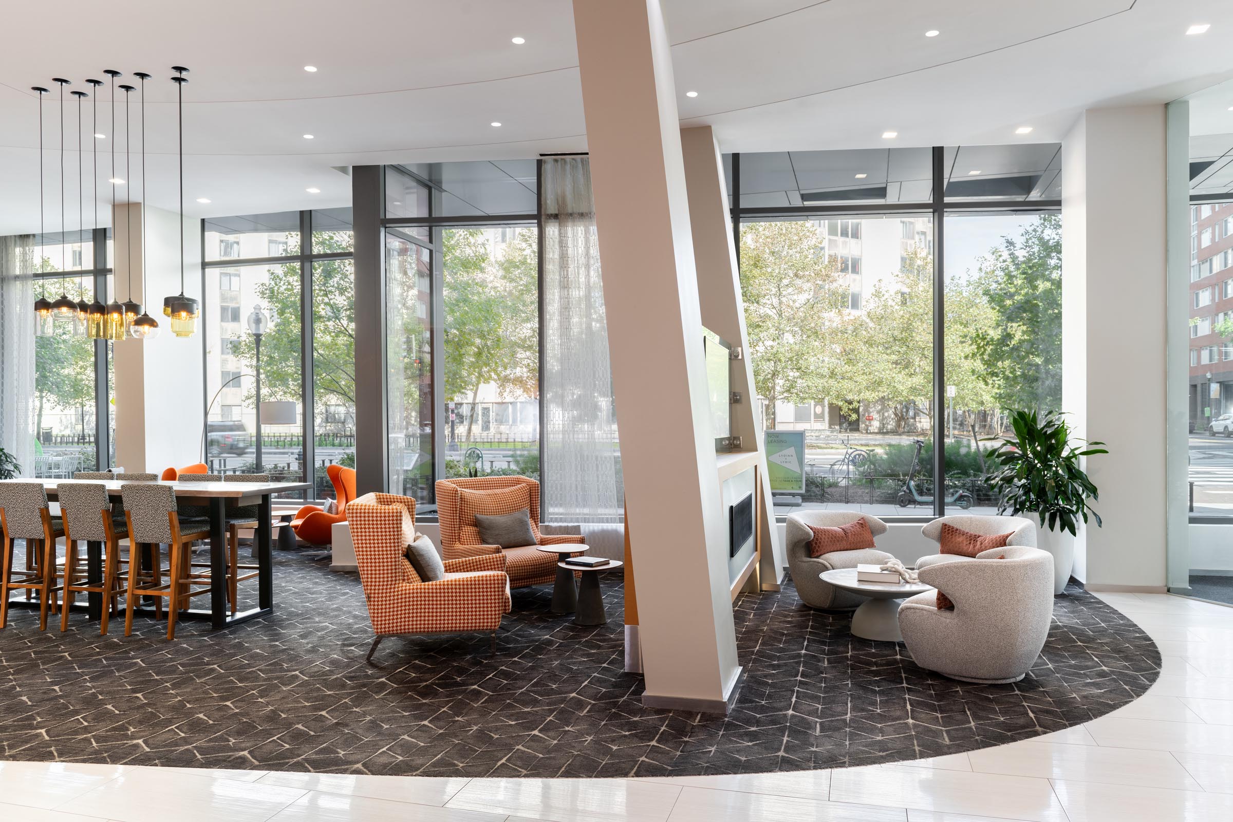 Lydian lobby with lounge seating and a communal table