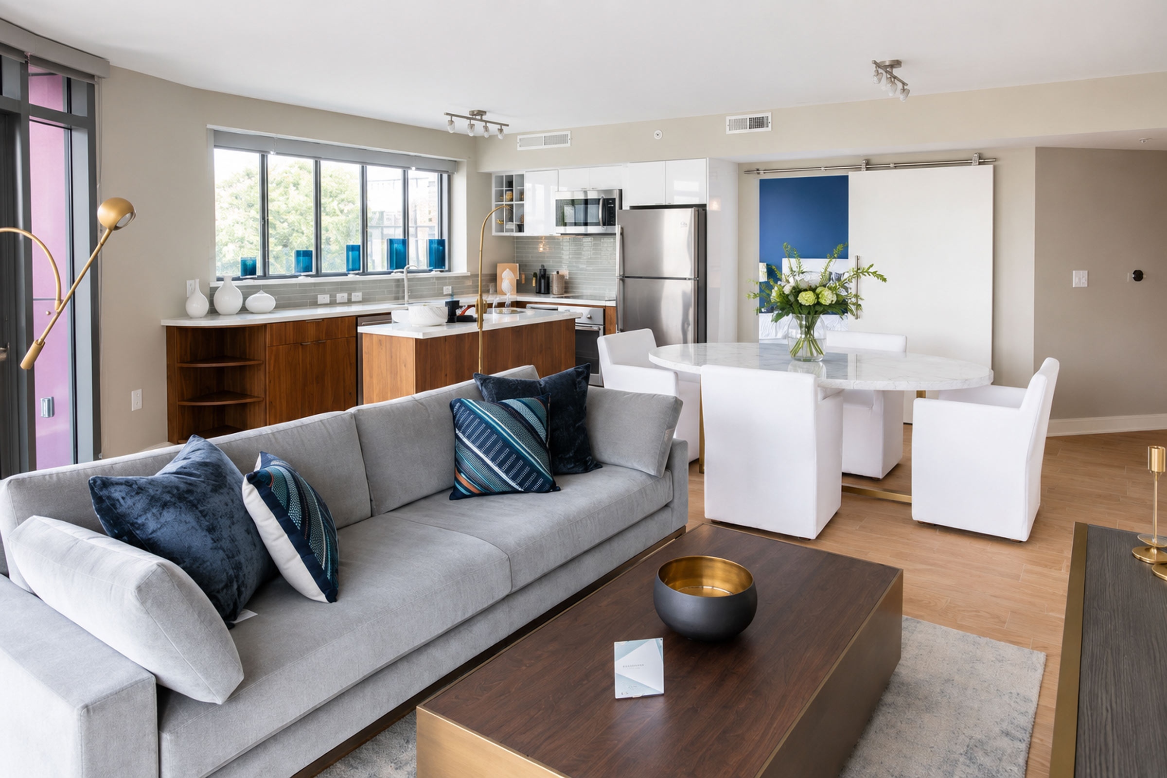 Open living area and kitchen in a Lydian apartment