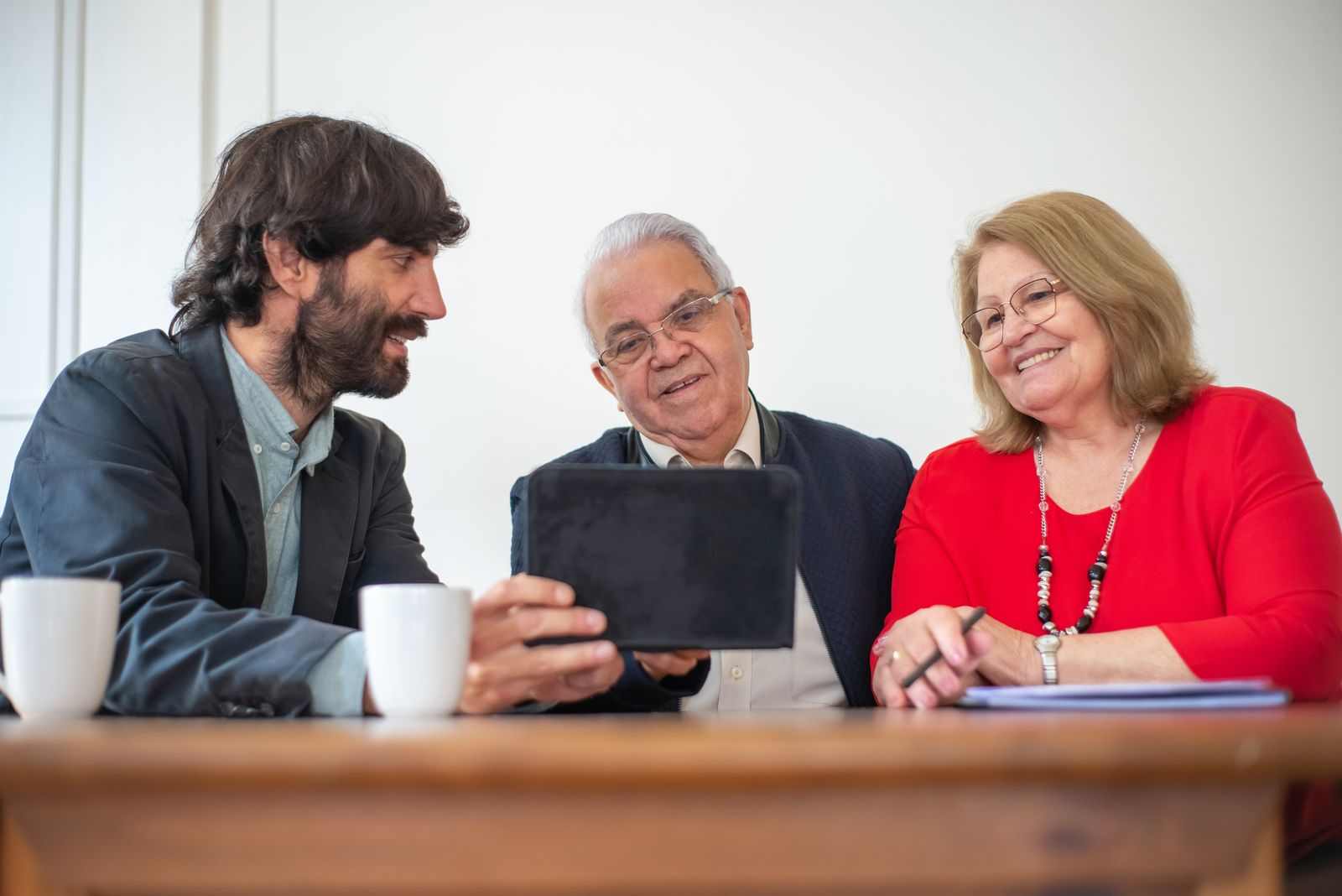 A financial advisor reviewing options with an older couple