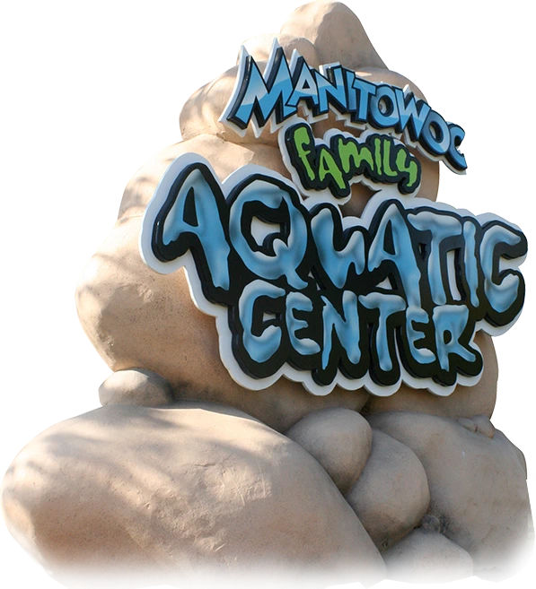 Aquatic center monument sign with custom lettering and sculpted boulders