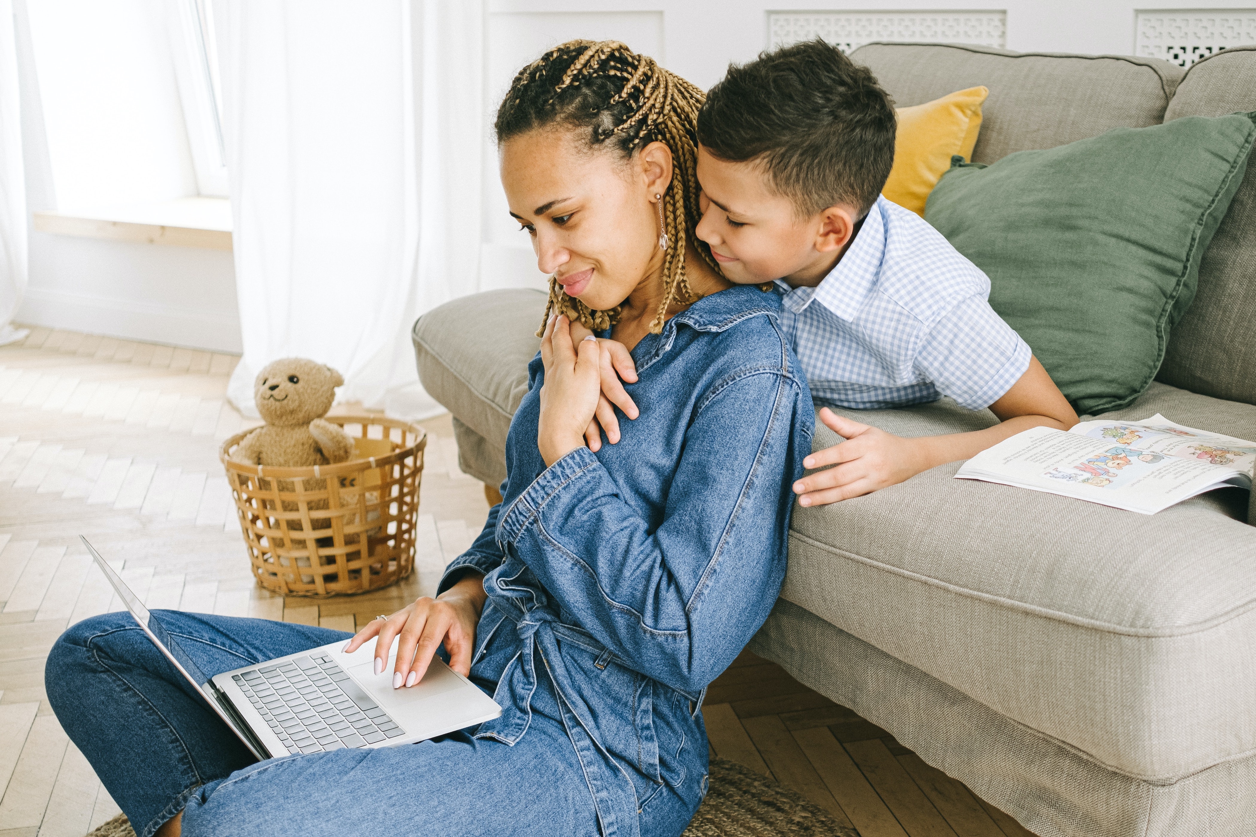 Mom and kid hugging stock image
