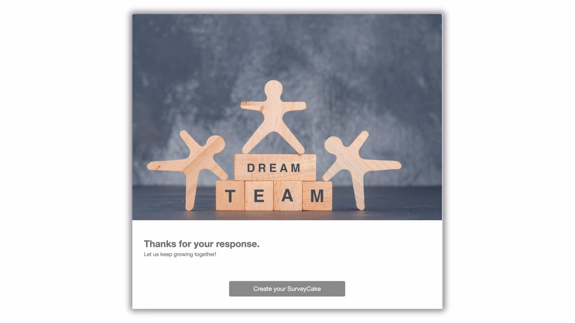 感謝頁:木製小人與 DREAM TEAM 積木照片,下方是感謝文字與轉址按鈕