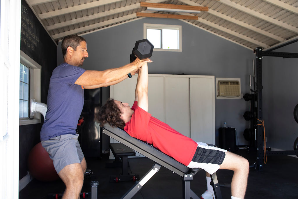 Coach Tom Hoffman training an athlete at Slash Athlete Studio City