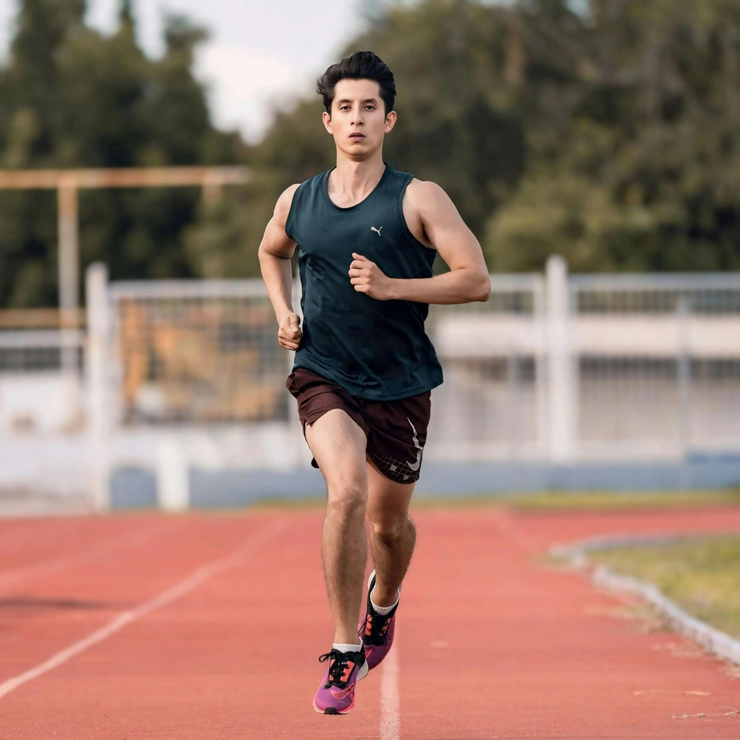 Runner on a track representing energy IV therapy