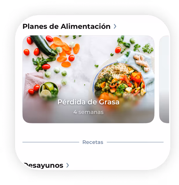 Plate of mixed vegetables and grains with scattered fresh vegetables on a white surface.