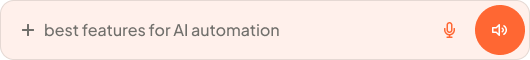 Search bar with typed text: best features for AI automation and voice input icons