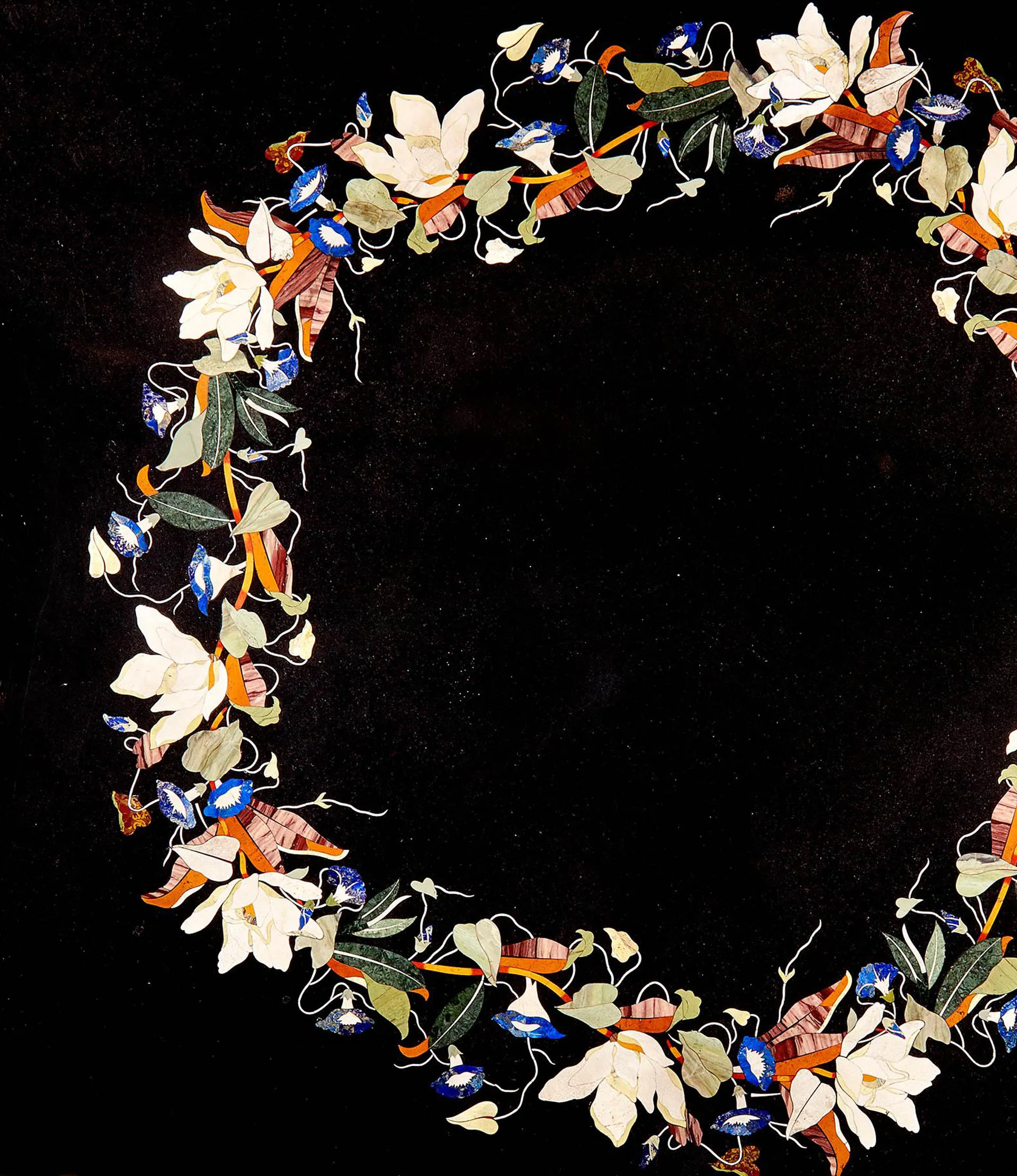 Black marble pietra dura panel with an inlaid wreath of white magnolias and blue morning glories