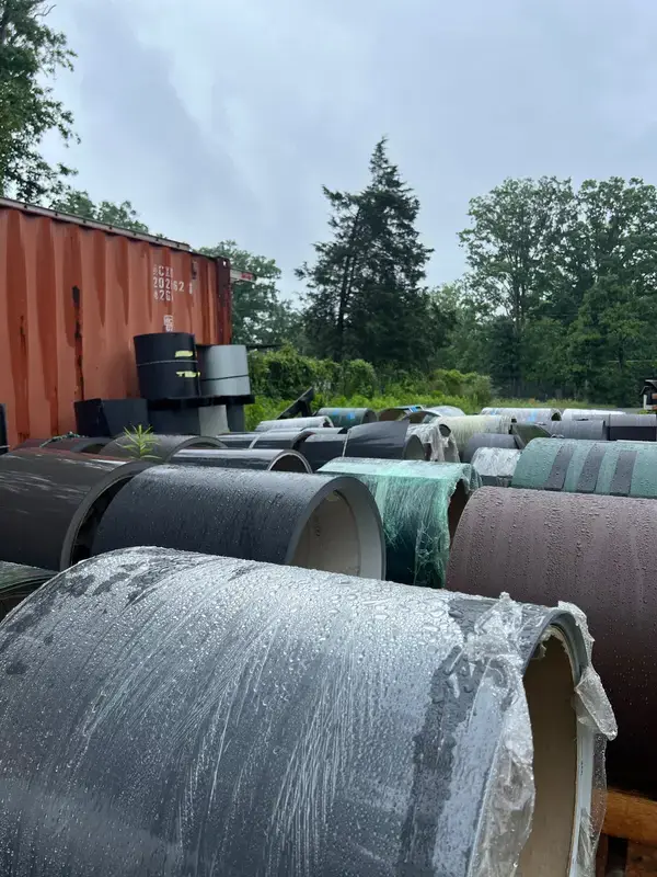 Metal roofing coils in several finishes stored for panel fabrication