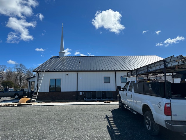 Benefits of On-Site Roll Forming for Standing Seam Metal Roofing Projects